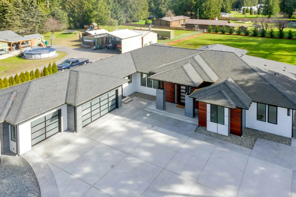 An arial view of a clean, modern house that has been pressure washed.