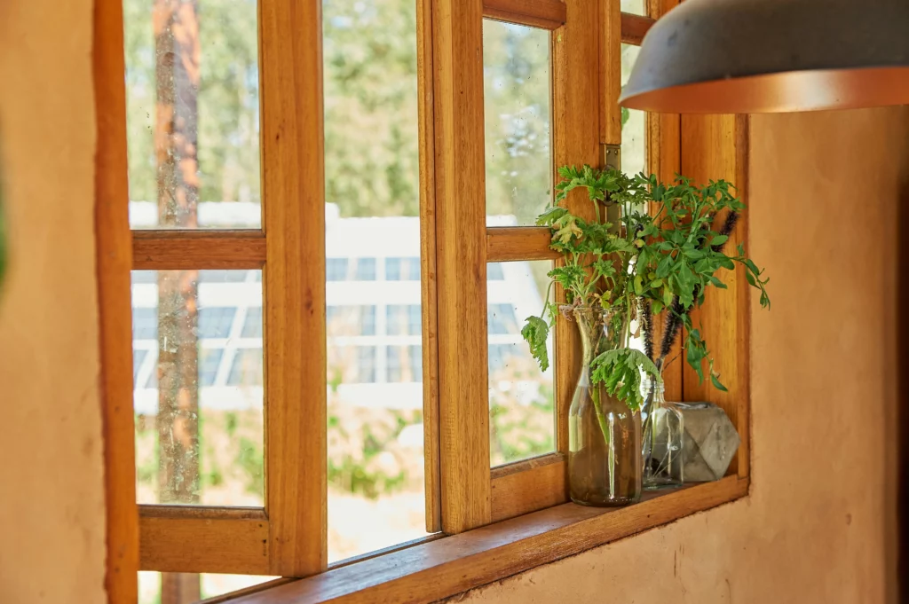 A warm wooden Window Screen Frame.