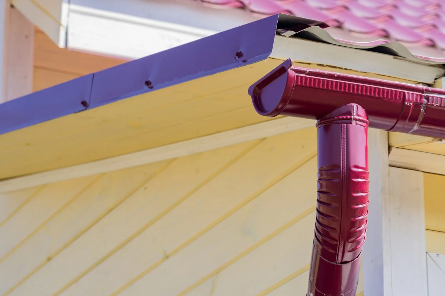 clean red gutters in austin